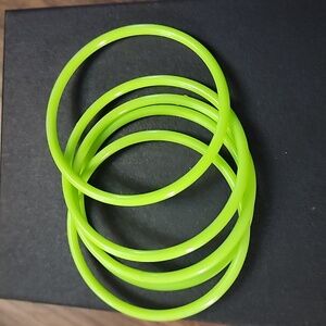 5 neon green plastic bracelets